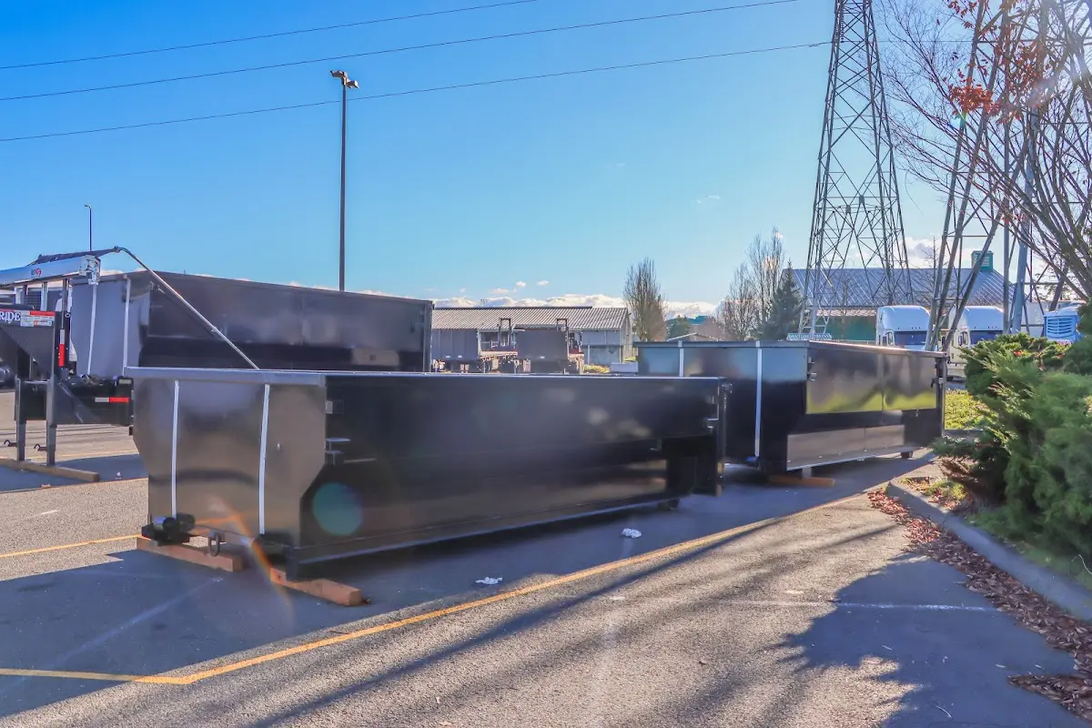 Roll-off dumpster ready for waste disposal at job site for Construction Dumpster Rental in Bradford